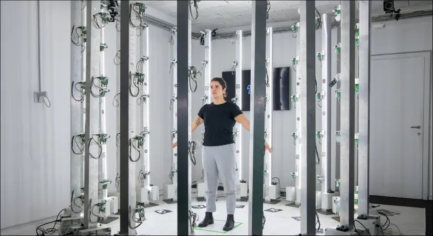 Woman in a 3D Scan cage